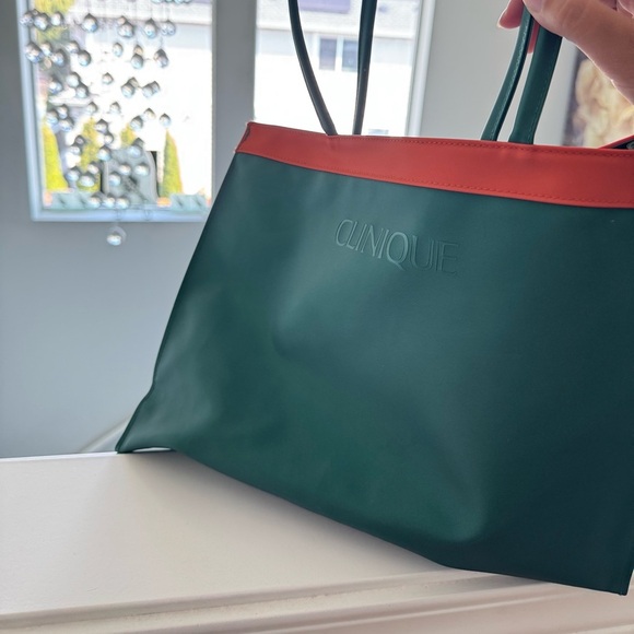 Clinique Handbags - Clinique Green and Orange makeup Bag